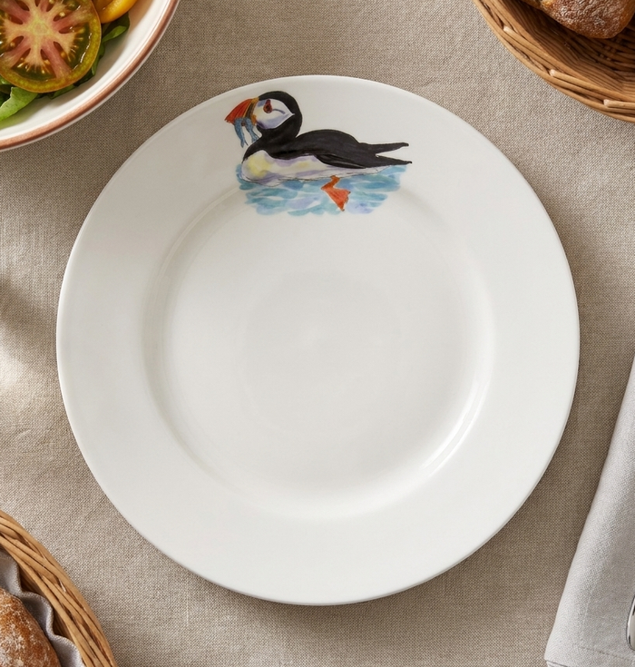 Puffin Swimming 26cm Flat Rimmed Plate styled on the table