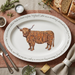 Highland Cow 39cm oval plate lifestyle