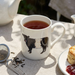 Belted Galloway Cow Mug straight sided lifestyle
