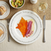 Conch Shell 30cm flat rimmed plate lifestyle image