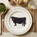 Dexter Cow 30cm flat rimmed plate lifestyle image