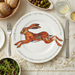 Hare Leaping 30cm flat rimmed plate lifestyle image