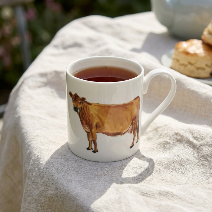 Jersey Cow Mug (medium straight sided) styled on the table