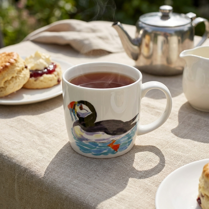 Puffin Mug (medium round sided) styled on the table