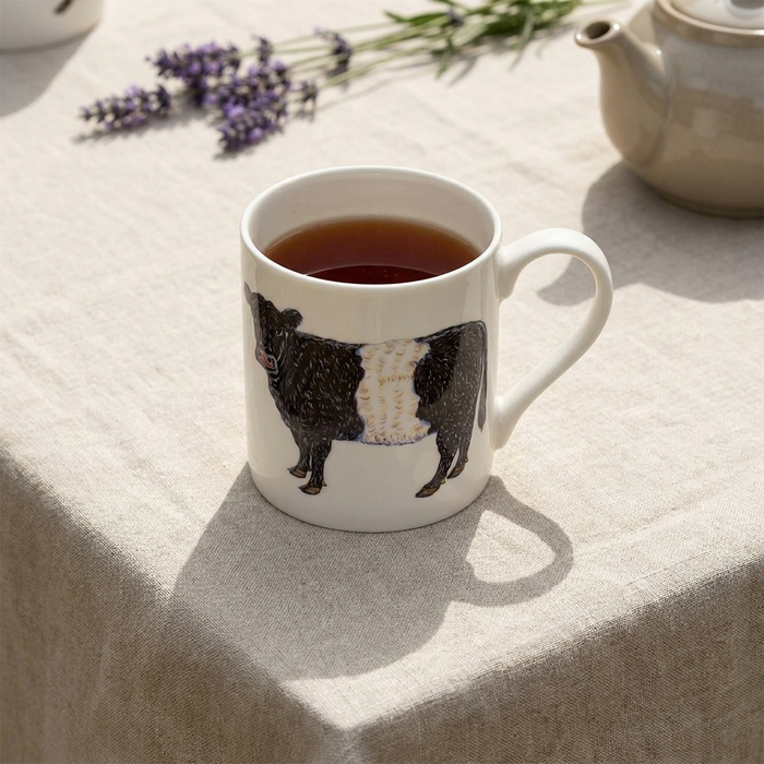 Belted Galloway Cow Mug (large size) styled on the table