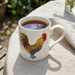 Cockerel & Hen Mug straight sided lifestyle