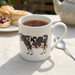 Holstein-Friesian Cow Mug straight sided lifestyle