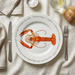 Langoustine 30cm flat rimmed plate lifestyle image