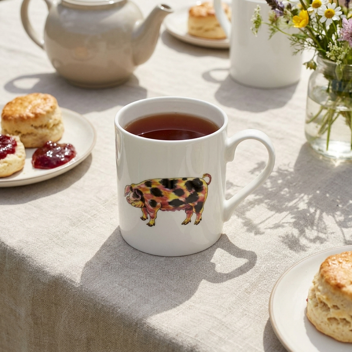 Gloucestershire Old Spot Pig & Saddleback Pig Mug (medium straight sided) styled on the table