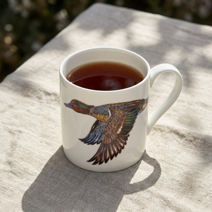 Teal Duck Mug (large size) styled on the table