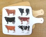 Cows Melamine Chopping Board styled on the table