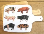 Pigs Melamine Chopping Board styled on the table